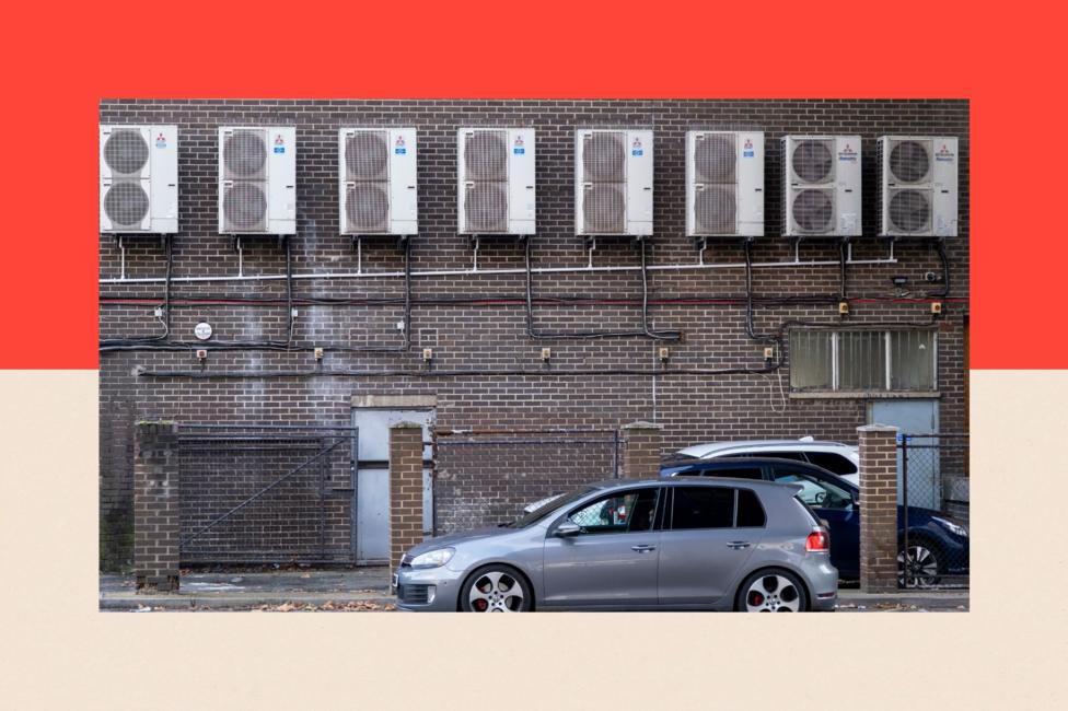 Air conditioning units at the base of a building in Stratford