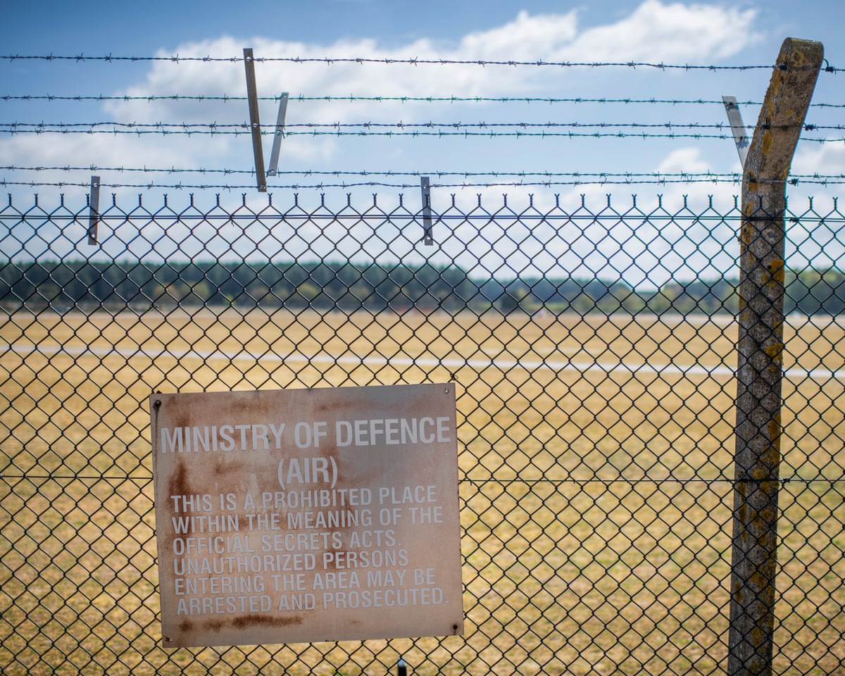 A sign on a fence outside the runway of RAF Lakenheath.
