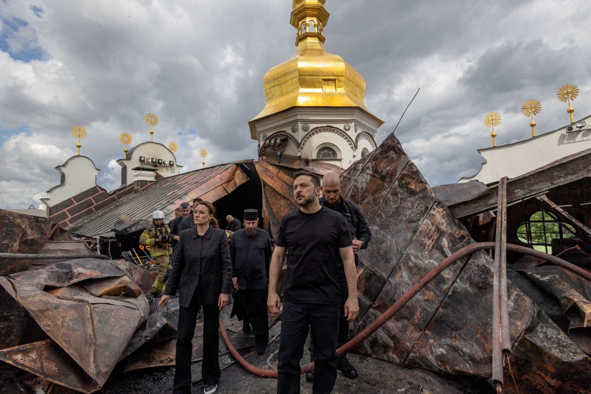 Zelenskiy, Svyrydenko and a third person at the damaged cathedral
