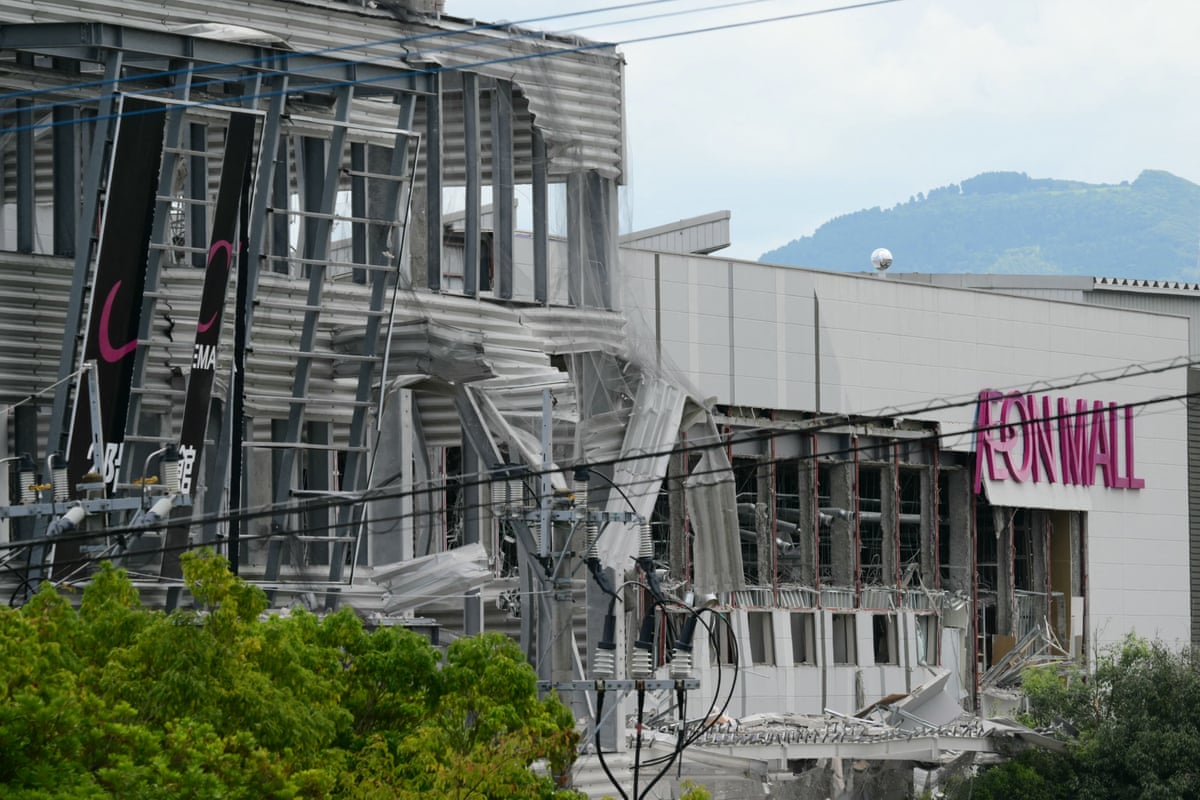 The damaged exterior of the Aeon shopping centre Kumamoto in Kashima.