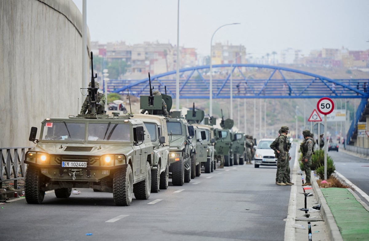 Spanish soldiers patrolling at the Spanish-Moroccan border in Ceuta on Friday.