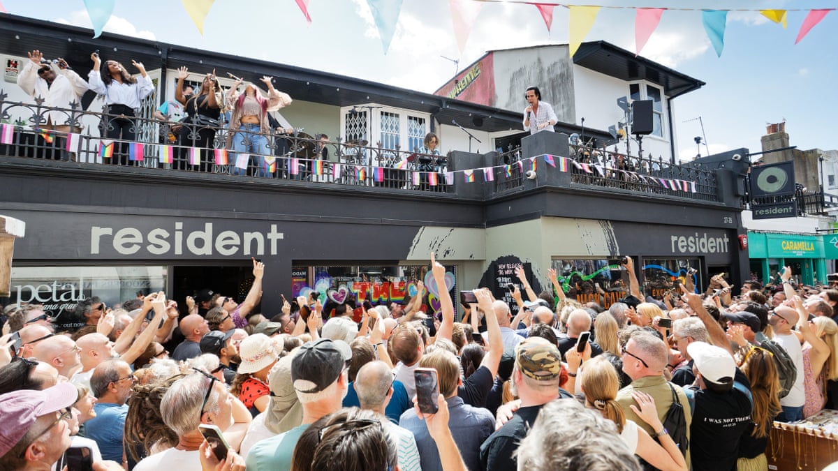 The view of Resident Records, with Nick Cave and the Bad Seeds performing on the balcony.