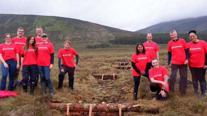 A number of people in a national park wearing red t-shirts
