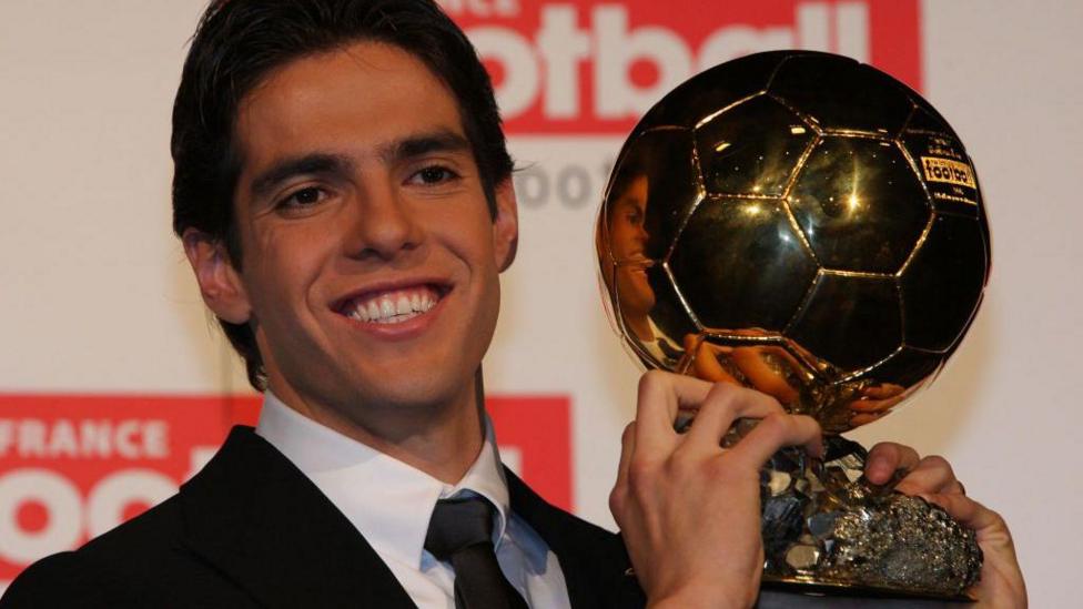 Kaka holding the Ballon d'Or trophy