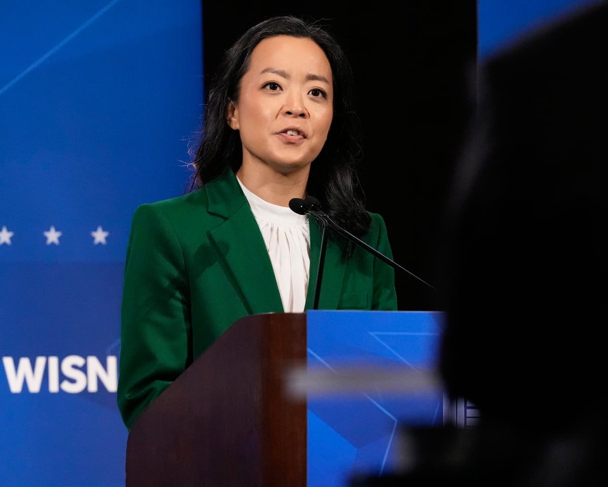 Francesca Hong speaking on stage at a lectern