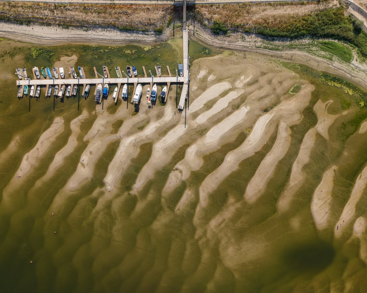 Drone view shows a boat at the port amid low water level of the Danube River in Batina, Croatia.
