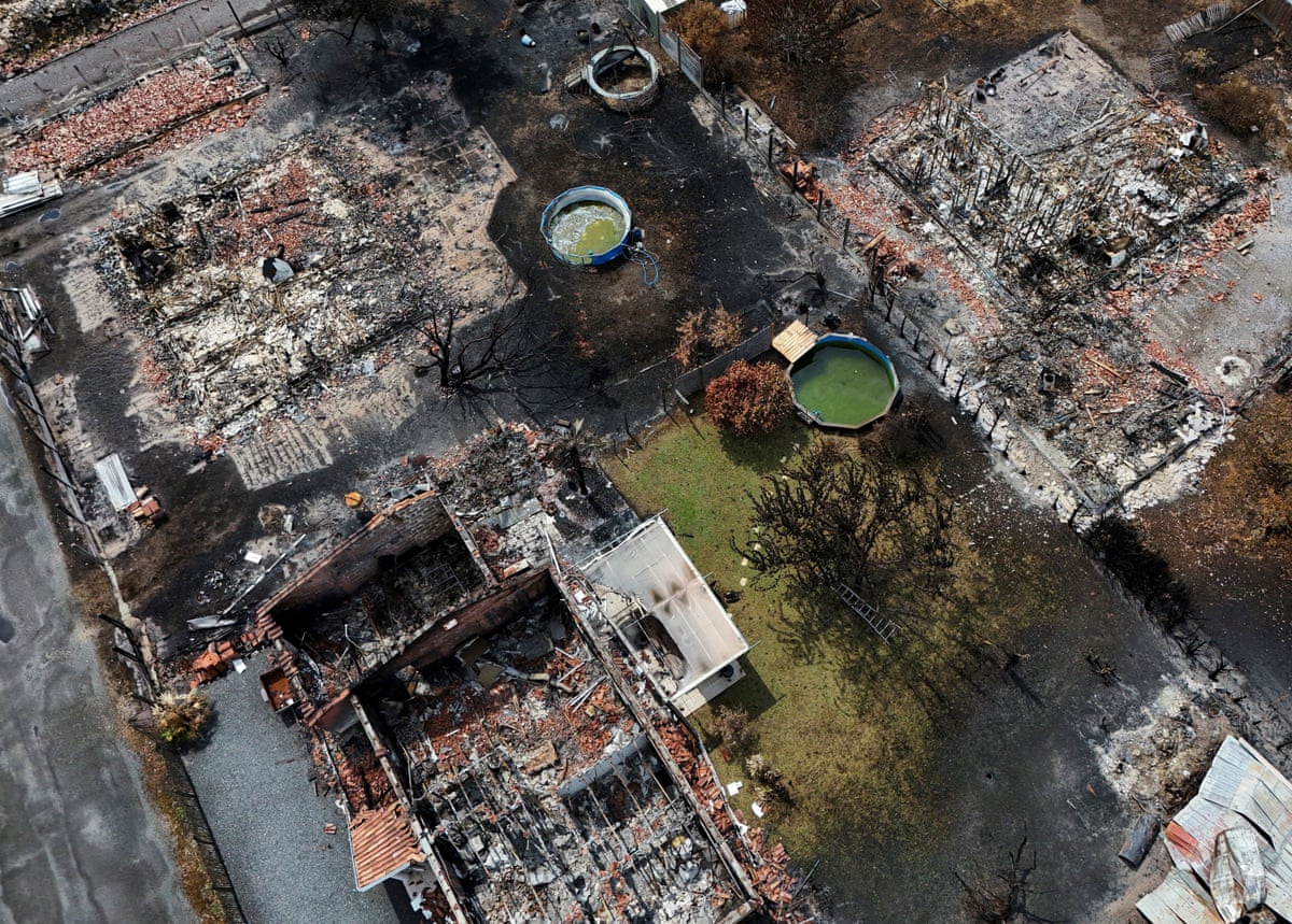 A drone view of buildings destroyed by a wildfire in Le Porge, Gironde department, France.
