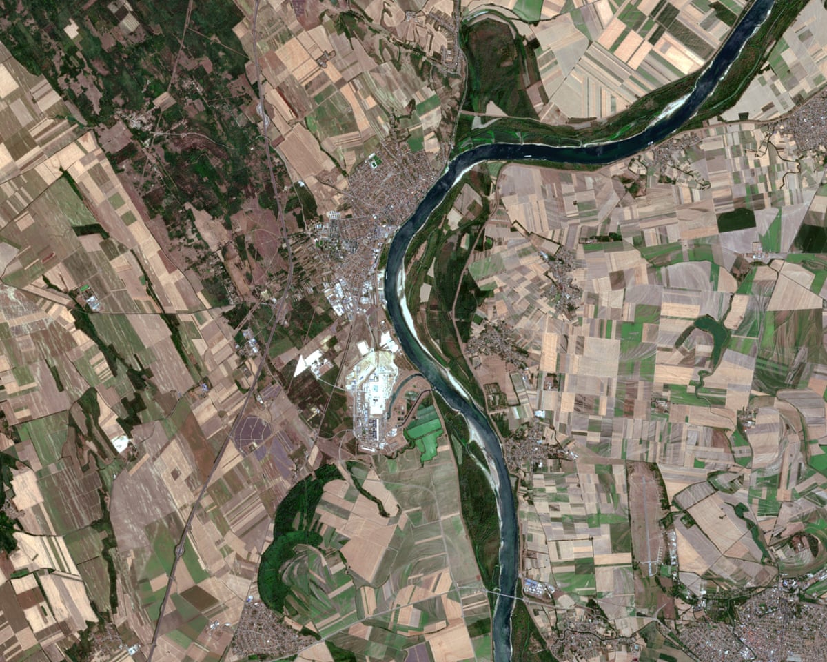 The Copernicus Sentinel-2 satellite shows the Danube River and its water levels as it passes through the town of Paks, as well as the Paks Nuclear Power Plant, south of Budapest, Hungary.