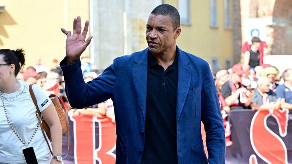 AC Milan's former Brazilian goalkeeper Dida waves to the crowd at Franco Baresi's funeral