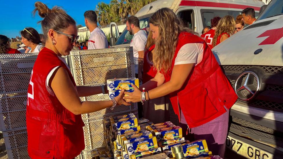 Red Cross personnel prepare food donations for migrants in Ceuta, Spain, 03 August 2026.