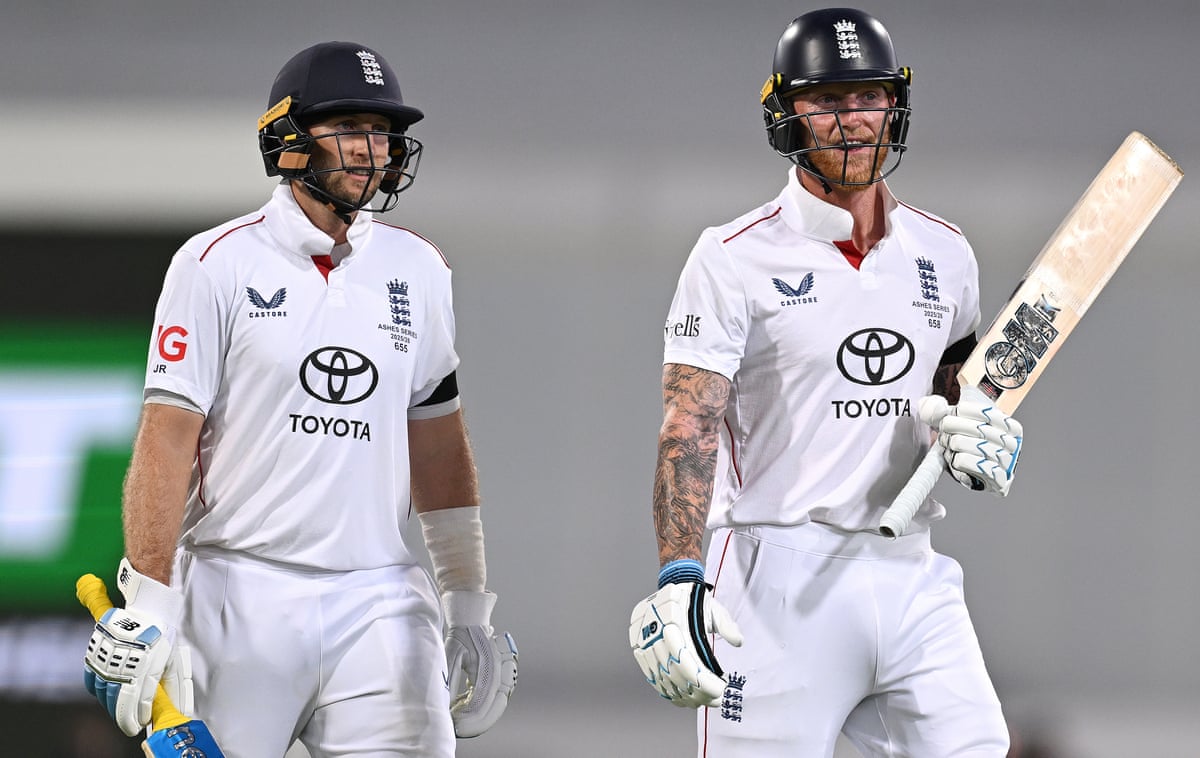 Joe Root (left) and Ben Stokes leave the field at the end of the second session on day one of the second Ashes Test in Brisbane