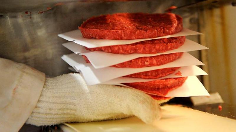 Burger patties being made at a meatpacking business in Colorado