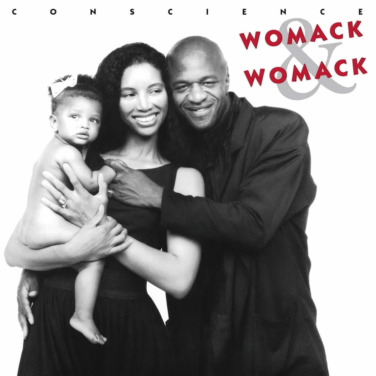 The Conscience album cover: the Womacks, smiling, with her holding a baby with a bow in her hair