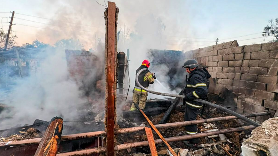 Firefighters tackle a blaze in a destroyed house after a Russian drone attack on Balakliya, north-eastern Ukraine. Photo: 6 August 2026