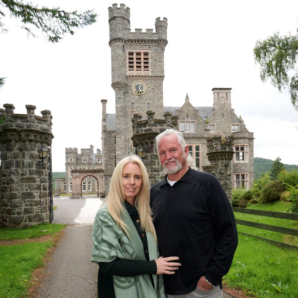 Suzanne and Lance at the gates to the castle.