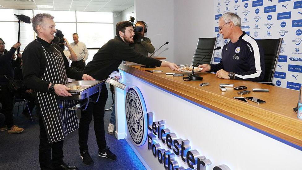Claudio Ranieri is presented with sausage