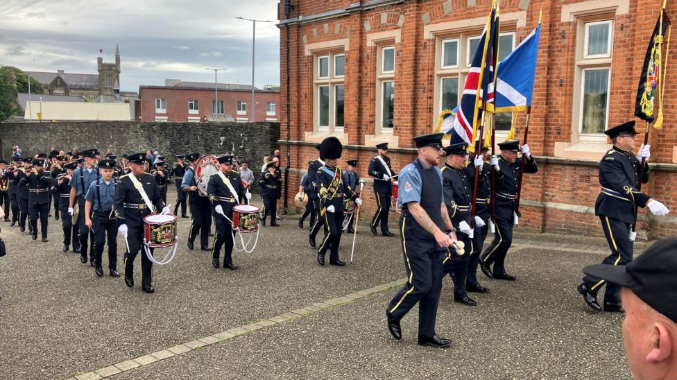 A band walking through the streets of Derry