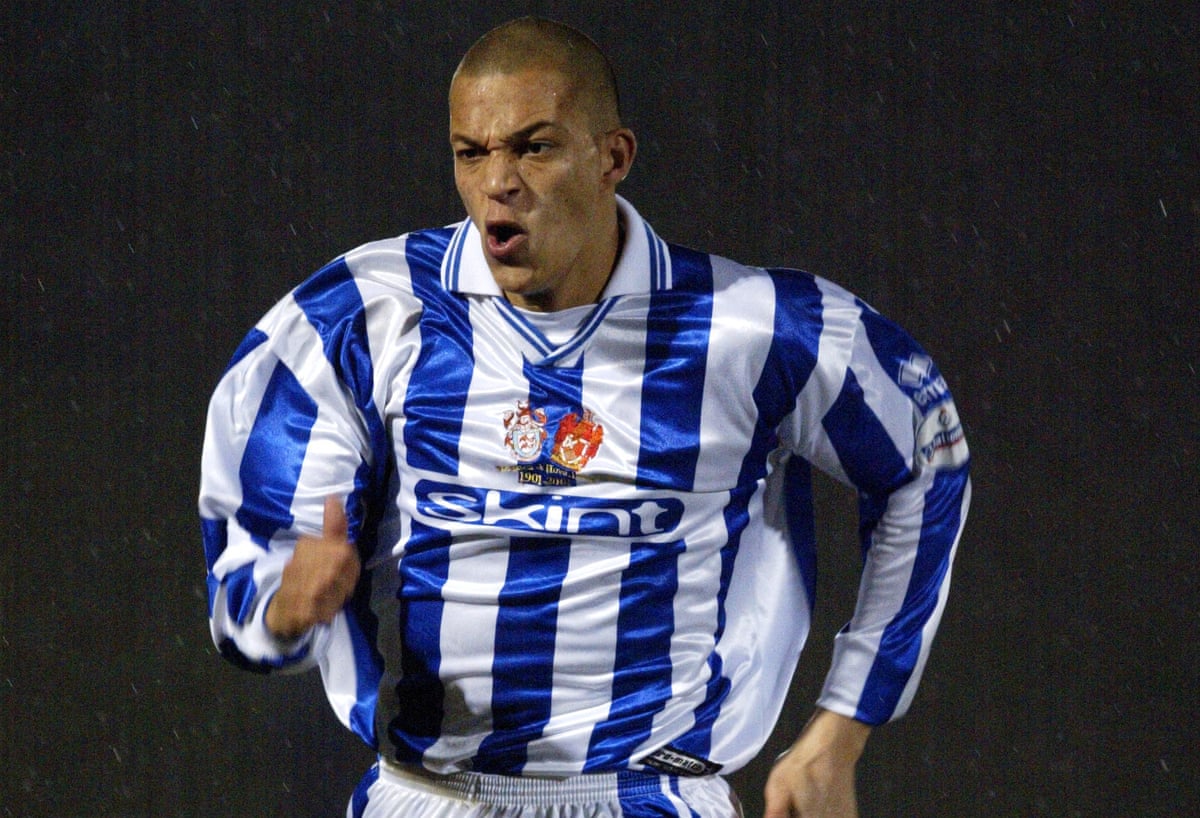 Bobby Zamora in Brighton’s home kit sponsored by Fatboy Slim
