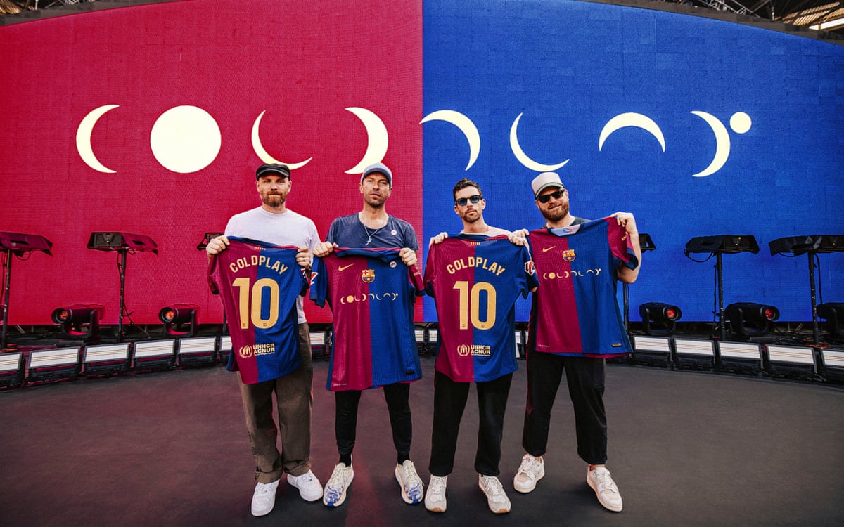 Coldplay show off their Barcelona shirts