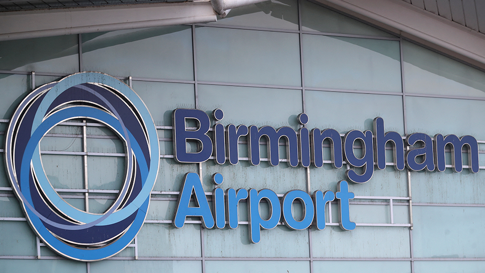 An exterior shot of the Birmingham Airport sign on the main terminal building