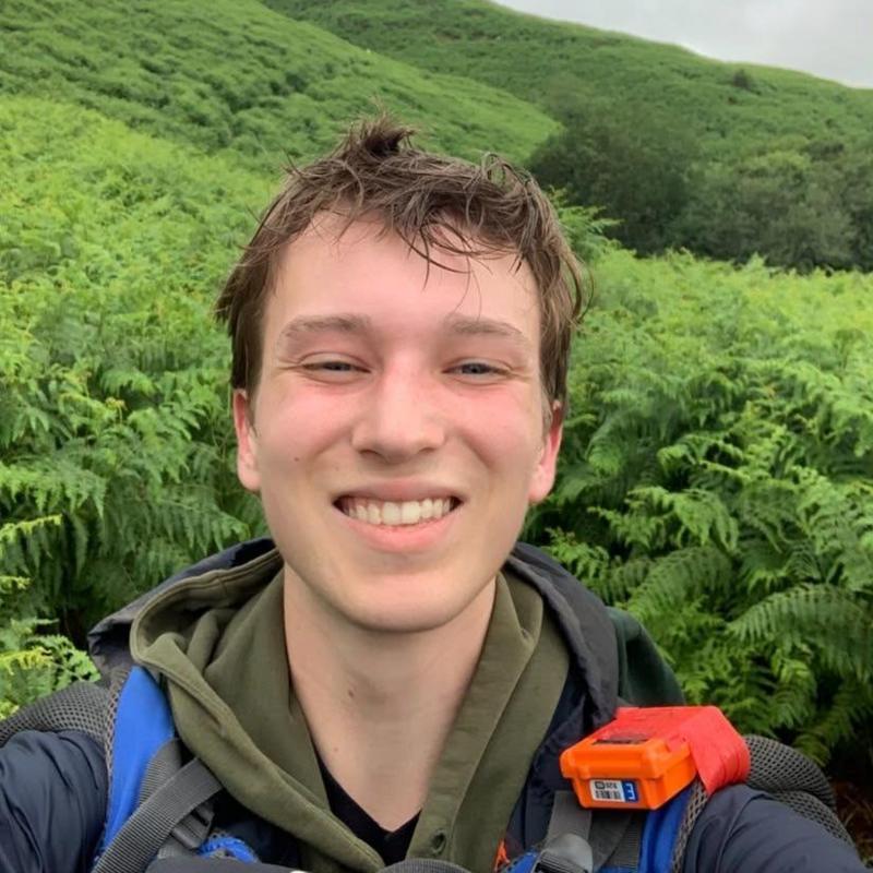 A selfie of Harrison on a walk in the nature