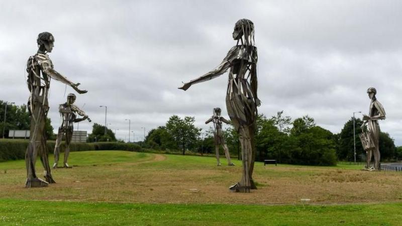 A Millennium Project sculpture named 'Let the Dance Begin' stands near the Irish border in Strabane, Northern Ireland