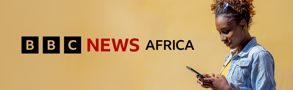 To the right of the banner a woman with sunglasses on her head and wearing a denim jacket and yellow T-shirt looks down at her mobile phone. A graphic for Africa in black and red is on the left of the image which has a pale golden brown background.