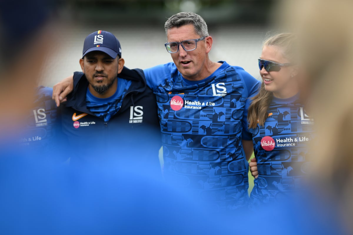 Jon Lewis, head coach of London Spirit, speaks to the team in a huddle before the Hundred match between London Spirit Women and Manchester Super Giants Women at Lord’s in July.