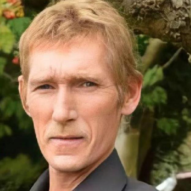 Keven Jones has dark blonde, short hair 