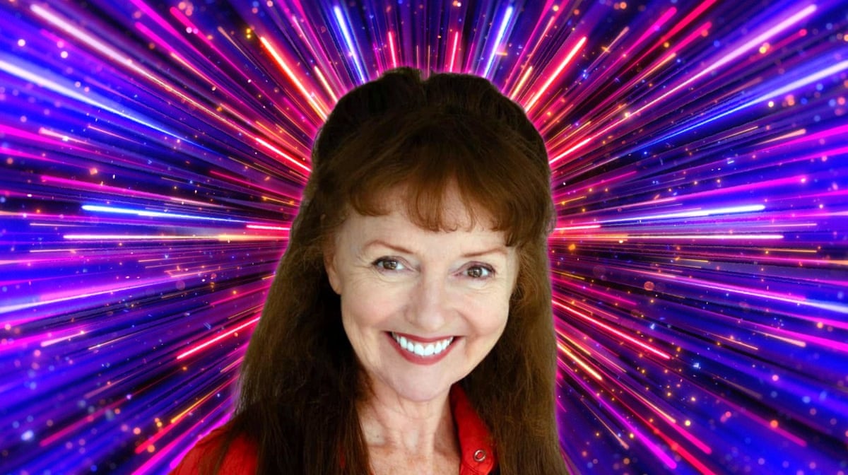 A brunette woman smiling