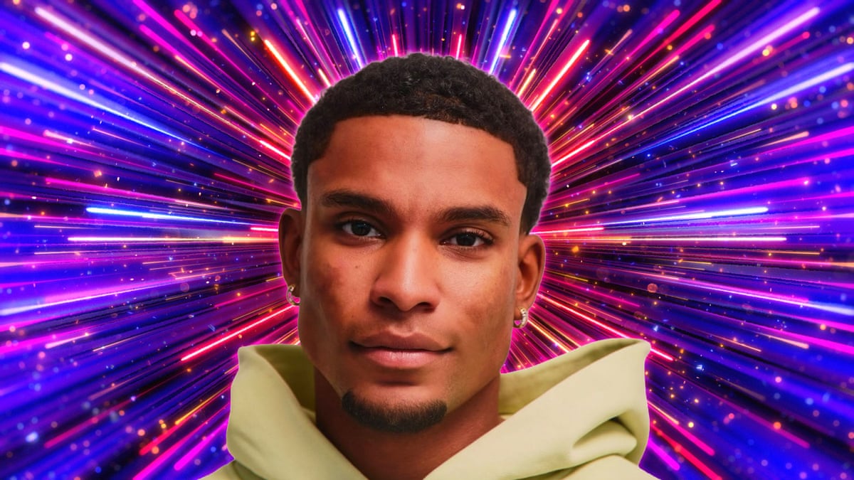 A man of colour wearing a yellow hoodie