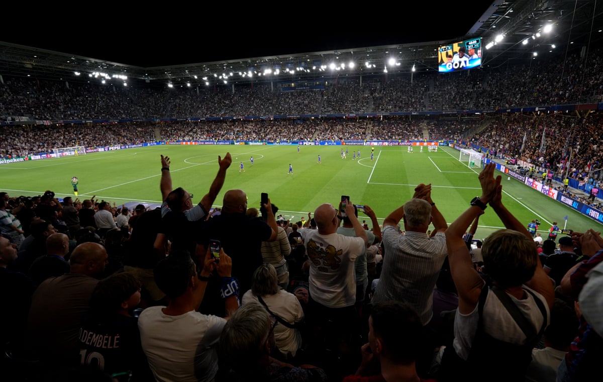 Fans celebrate in the stands after Brian Madjo of Aston Villa scores his team's first goal