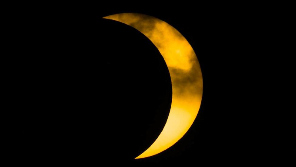 Moon nearly passes the Sun
