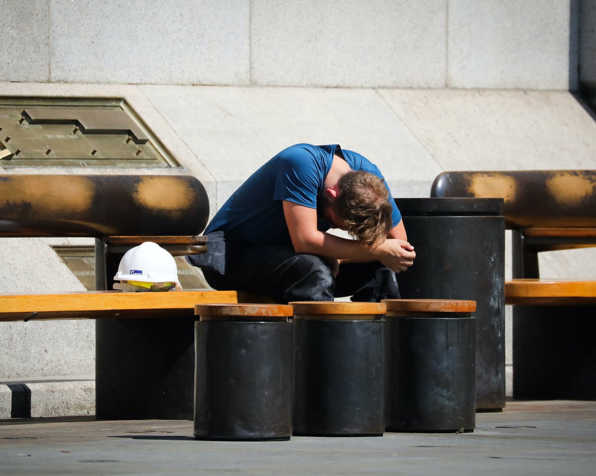 A man has had enough of this heat in in Trafalgar Square in London during the fifth heatwave of the season.