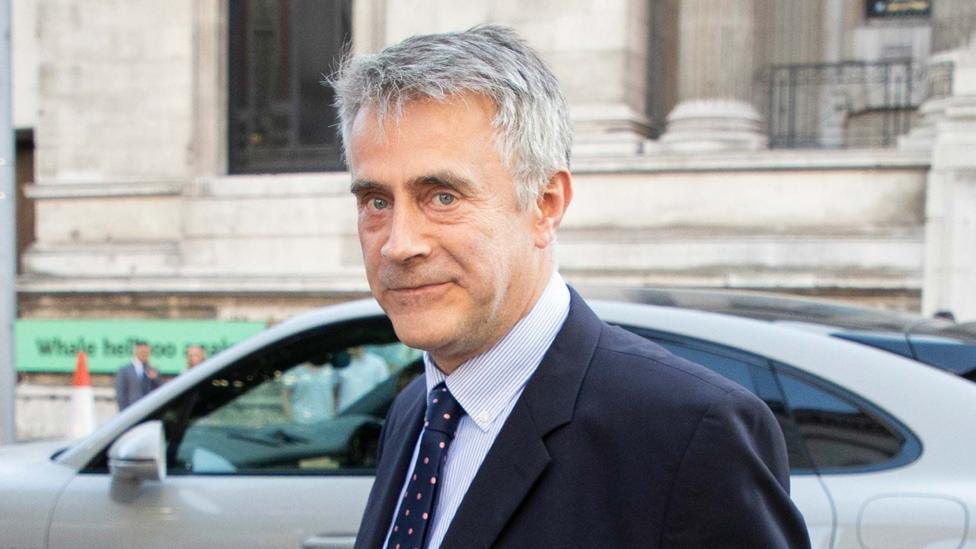 Christopher Harborne arrives at the Victoria and Albert Museum during the Conservative Party Summer Party in 2022. He is a middle aged man with short grey hair in a suit and tie
