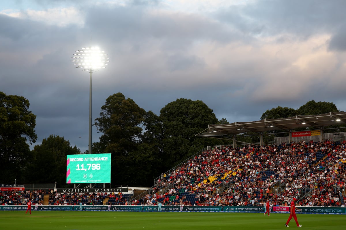 View of packed stand at Sophia Gardens next to scoreboard displaying record crowd figure