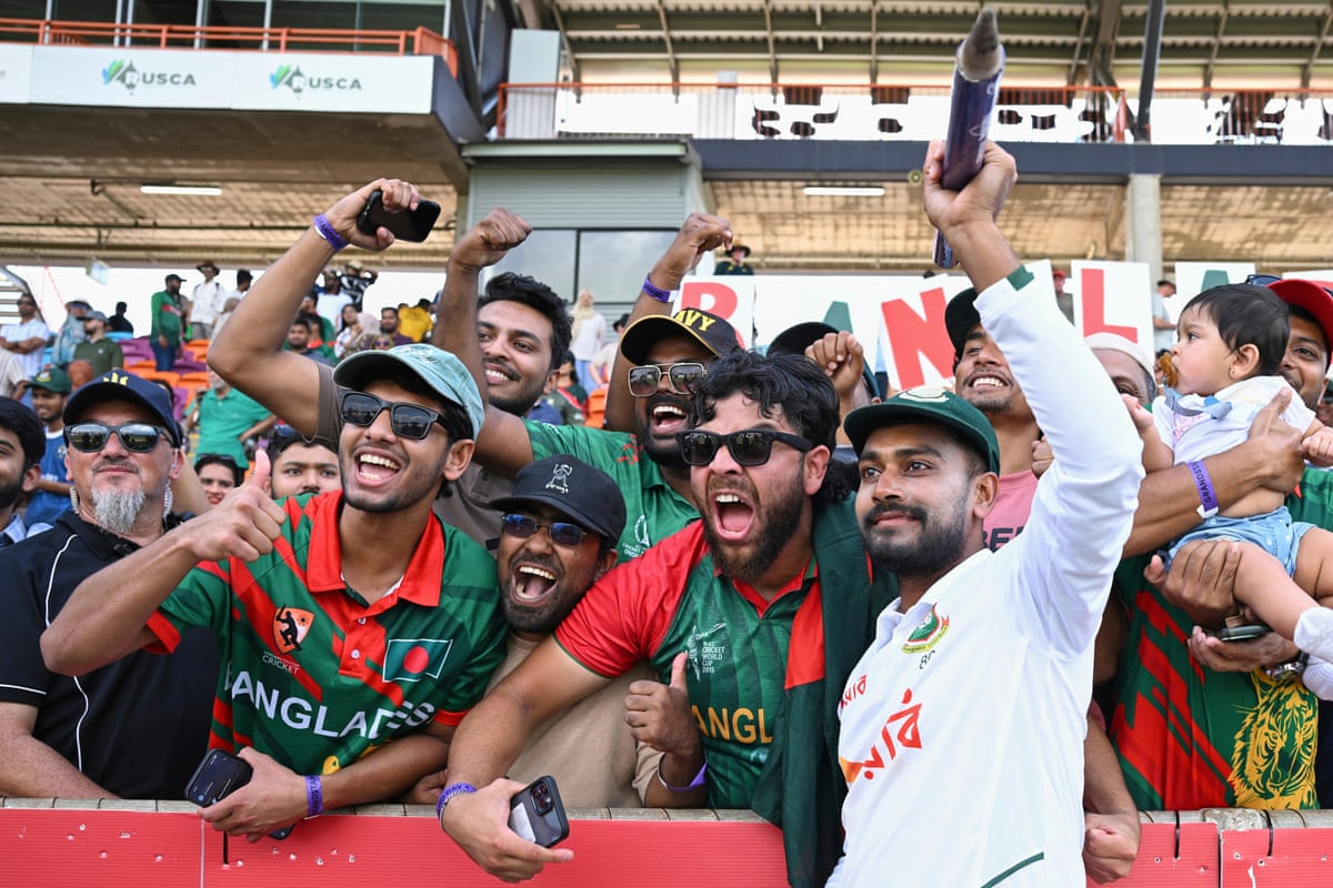 Mehidy Hasan Miraz celebrates with Bangladesh fans at the end of day four.