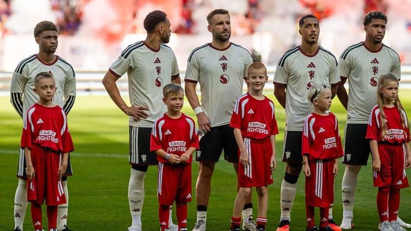 Manchester United's new signings Andrey Santos (right) and Youri Tielemans (second right)