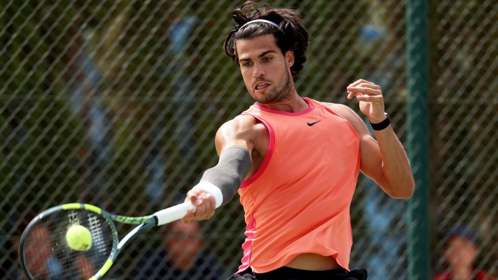 Carlos Alcaraz hits a forehand in a practice session in Murcia
