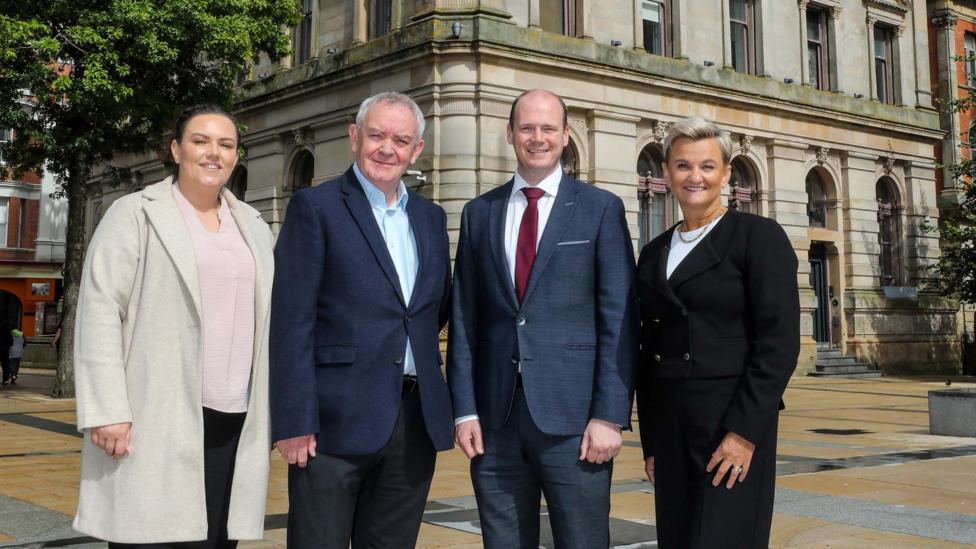 Pictured (L-R) outside the former Danske Bank building in Londonderry are Shona Campbell, General Manager Inner City Trust; Damian McAteer, Inner City Trust; Communities Minister Gordon Lyons MLA and Vicki Hassan, Operations Director at Danske Bank