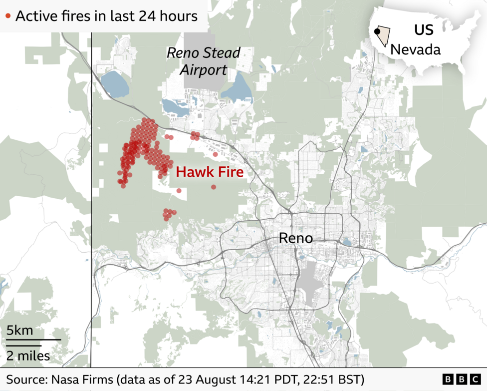 Map showing active fire detections linked to the Hawk Fire west of Reno, Nevada, over the previous 24 hours. Red dots marking fire activity are concentrated near Reno Stead Airport, with the city of Reno to the south-east. 