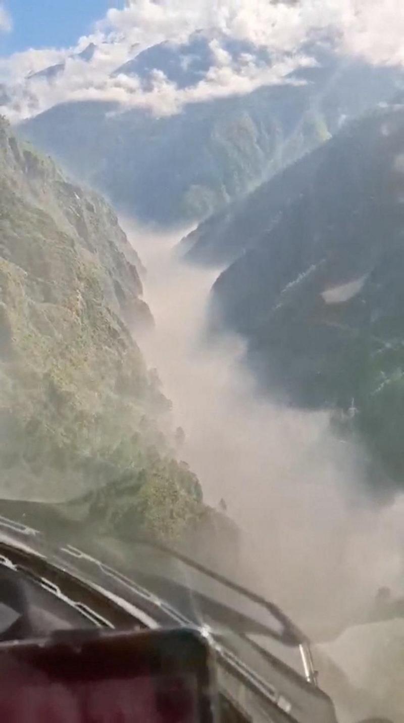 Helicopter footage shows flash flooding in the valleys in Rasuwa, Nepal, August 26, 2026, in this screengab taken from a handout video.
