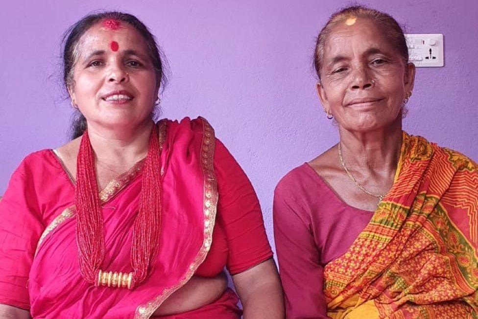 Tulasha Lamichhane and Krishna Kumari Lamichhane, two women in traditional dress who escaped the Nepal flash floods.