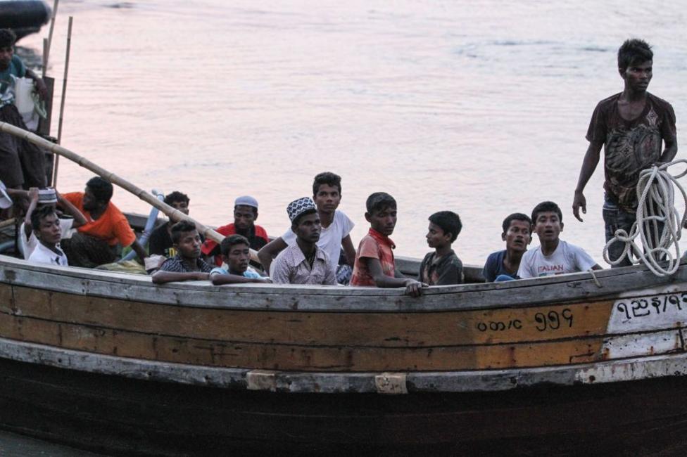 Rohingya refugees detained in Malaysia territorial waters off the island of Langkawi arrive at a jetty in Kuala Kedah, northern Malaysia on April 3, 2018. - The boat carrying dozens of Rohingya from Myanmar arrived in Malaysia on April 3 and the refugees will be allowed to enter the country, but an expert downplayed fears it might herald a new mass exodus. (Photo by - / AFP) / Malaysia OUT (Photo by -/AFP via )