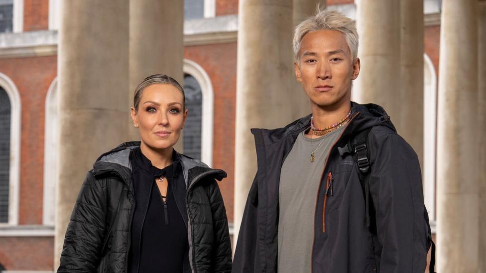 Photo: theukpulse.co.uk Carlos Gu and Amy Dowden pictured side by side in a promotional photo for the Channel 4 show, Celebrity Hunted. Carlos is