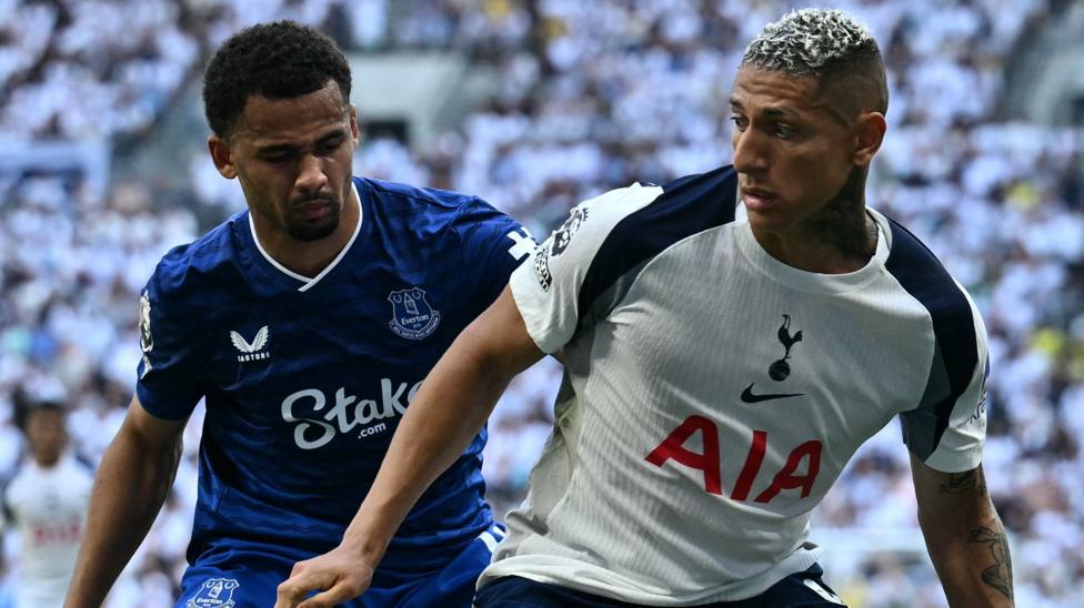 Tottenham Hotspur's Brazilian striker Richarlison vies with Everton's Senegalese striker Iliman Ndiaye for the ball