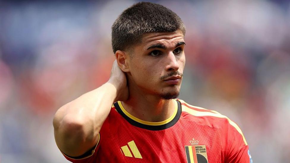 Matias Fernandez-Pardo with his hand on the back of his head