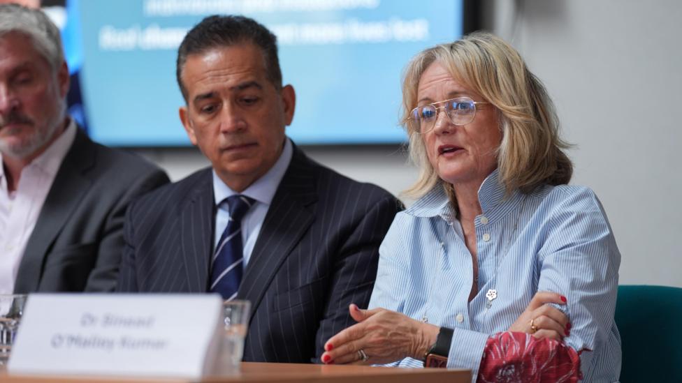 Sanjoy Kumar and Sinead O'Malley-Kumar at a press conference