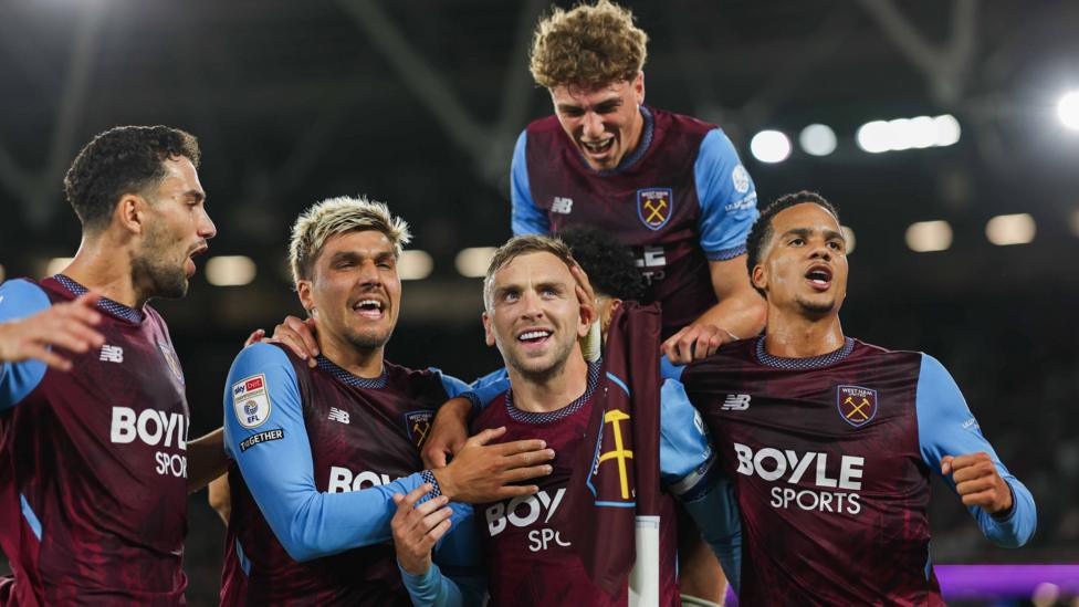 West Ham players celebrate a goal against Wolves