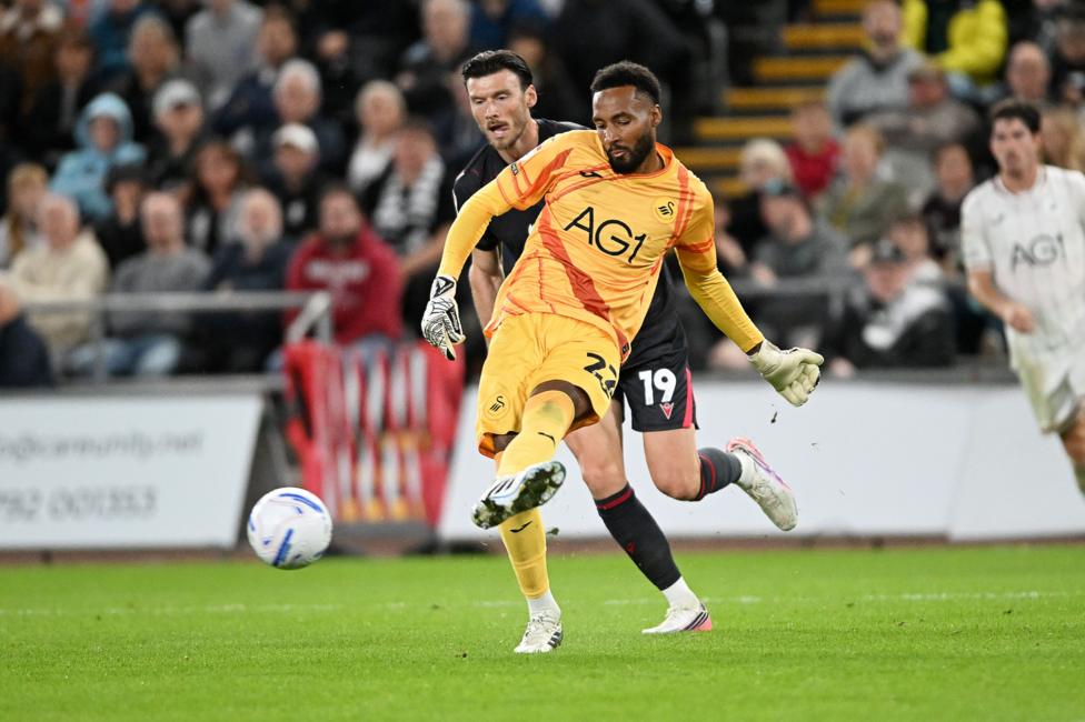 Swansea goalkeeper Lawrence Vigouroux pictured playing a pass forward